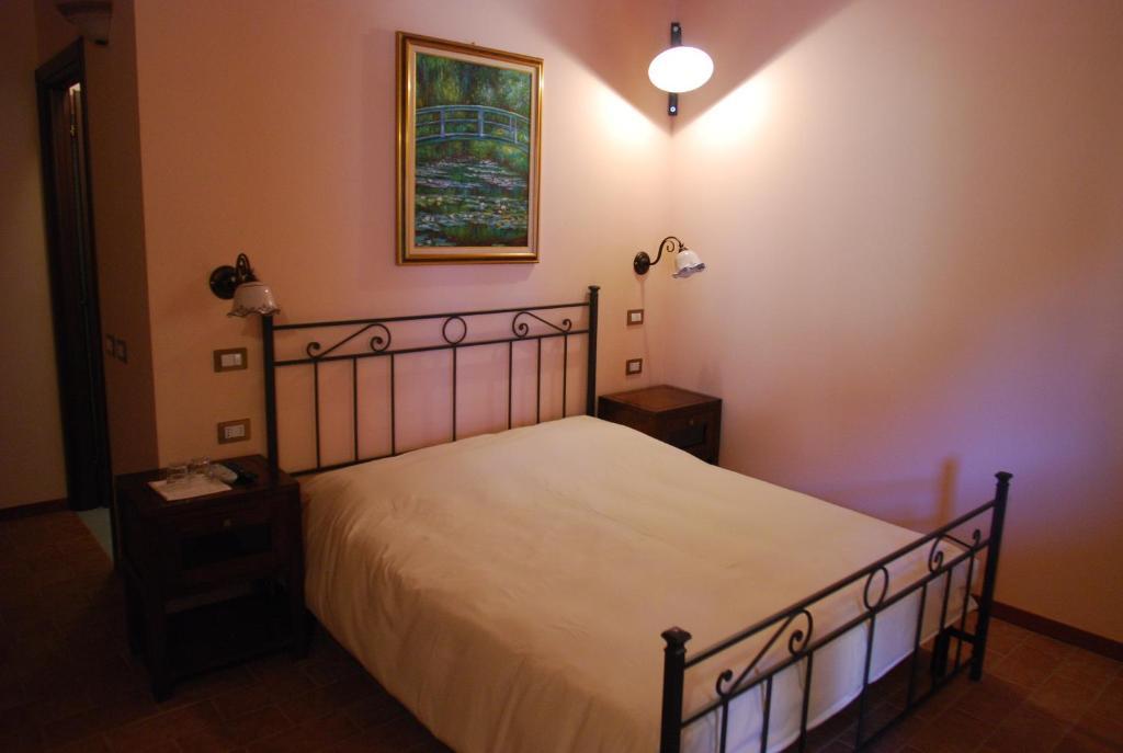 برانيانا ميلانيسي Agriturismo Cascina Madonnina الغرفة الصورة